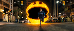 Pac-Man chases Ludlow (Josh Gad) in Columbia Pictures' PIXELS.